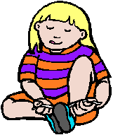 Girl tying shoes.